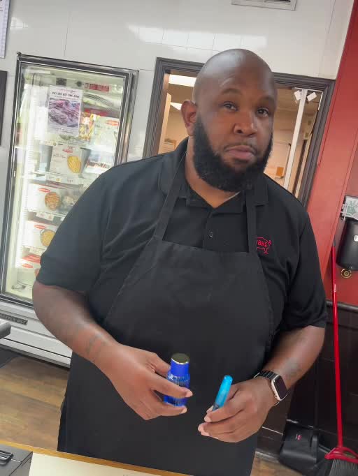 Customer holding MinkJuice fragrances